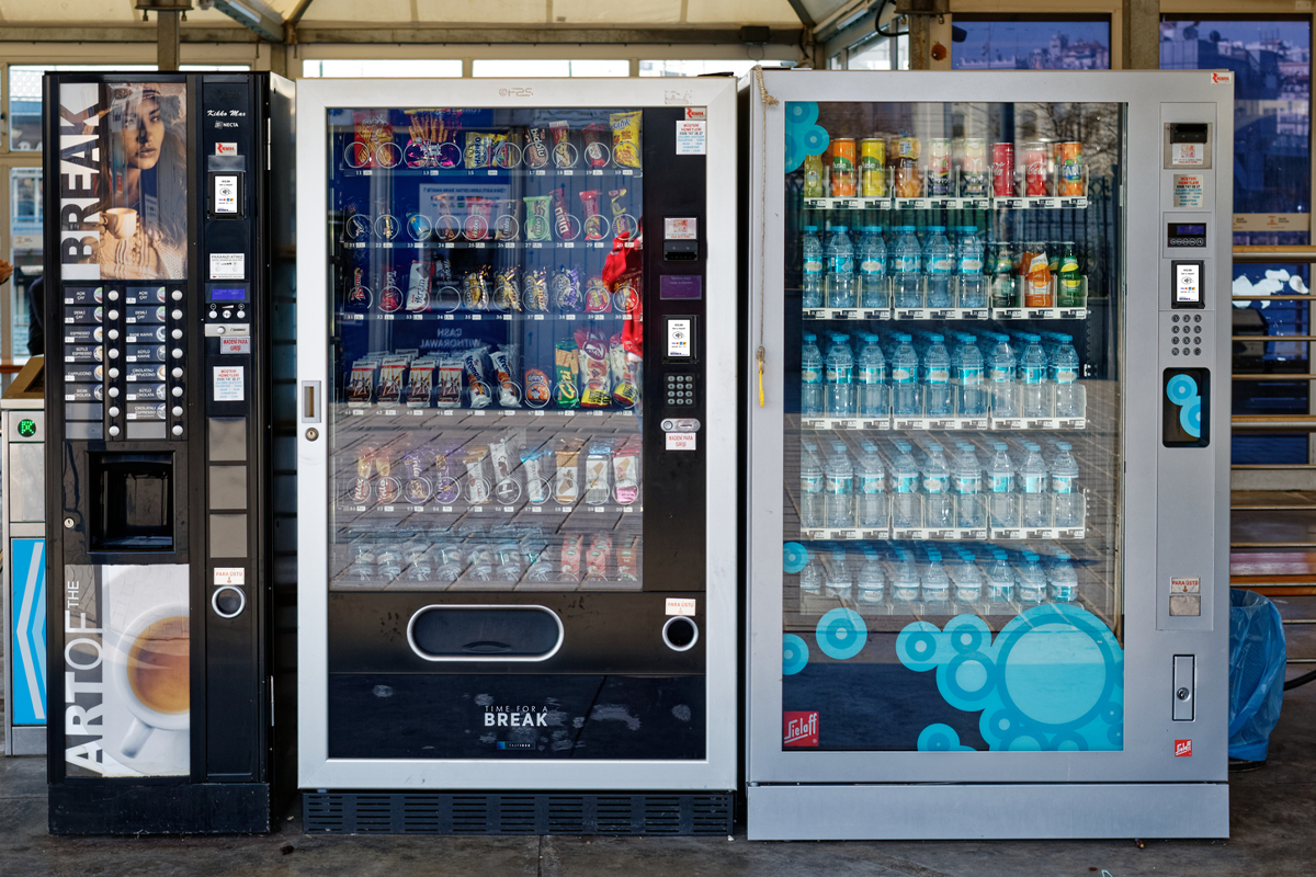Boost Vending machines revenue with equipped with cashless payment readers for snacks, drinks, and coffee, showing an upgraded setup for modern vending operations.